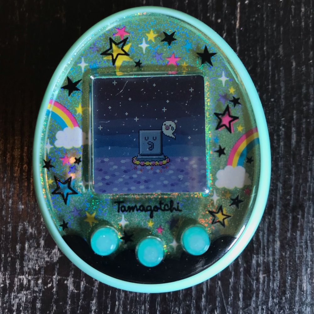Tamagotchi on blue. Barely used with directions.